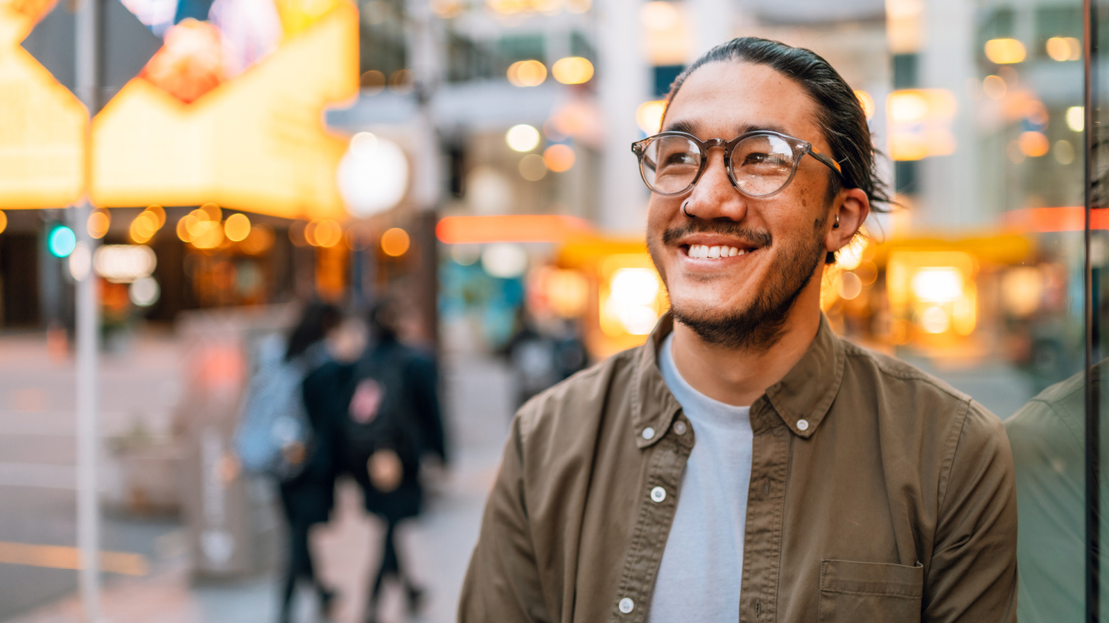 a man smiles 