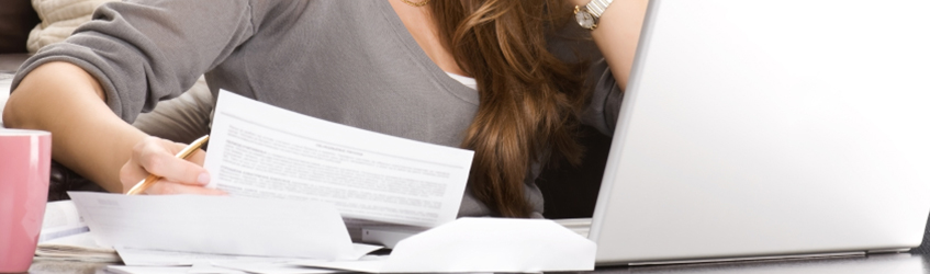 A woman working on her laptop